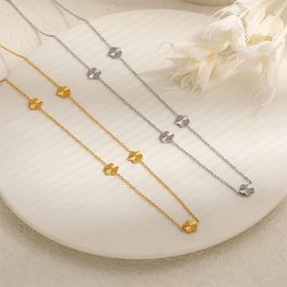 TN804 Dây chuyền nữ titan hoa mai móc máy cách điệu