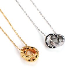 TN636 Dây chuyền titan nữ 2 khoen lồng họa tiết quả trám