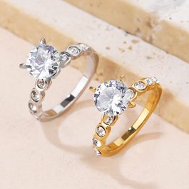 TC016 Nhẫn nữ titan 1 hột đứng đính kim cách điệu 2 bên