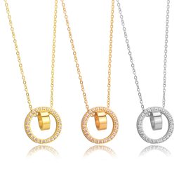 TN356 Dây chuyền titan 2 nhẫn lồng đính đá