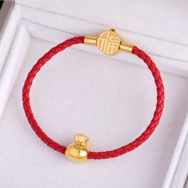 TV137 Vòng tay titan da đỏ túi tiền may mắn