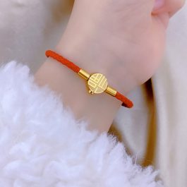 TV137 Vòng tay titan da đỏ túi tiền may mắn