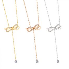 TN445 Dây chuyền titan nơ rớt cách điệu 1 viên đá