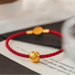 TV138 Vòng tay titan da đỏ kim tiền may mắn