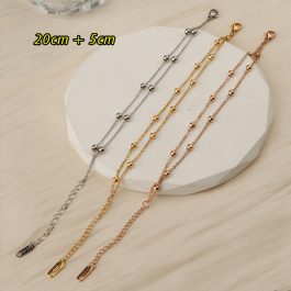 TA669 Lắc chân nữ titan 2 tầng bi cách điệu