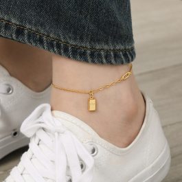 TA682 Lắc chân nữ titan thỏi vàng