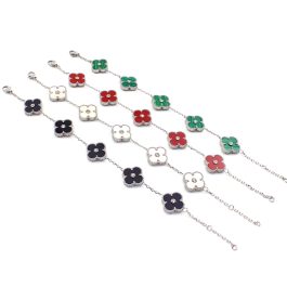 TA453 Lắc tay titan màu tự nhiên hoa 4 cánh van cleef LV đính đá ở giữa