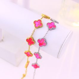 TA489 Lắc tay van cleef hoa 4 cánh nền màu hồng đậm dạ quang