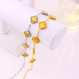 TA492 Lắc tay van cleef hoa 4 cánh nền màu hổ phách