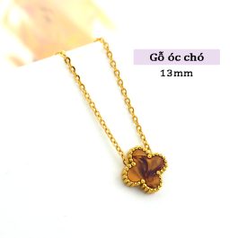 TN814 Dây chuyền titan hoa 4 cánh van cleef nền màu gỗ óc chó