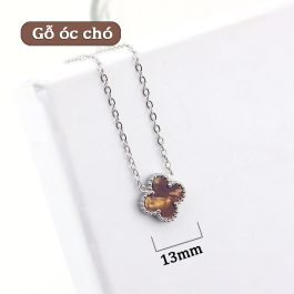 TN835 Dây chuyền titan hoa 4 cánh van cleef nền màu gỗ óc chó