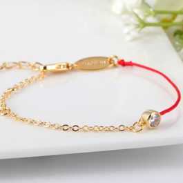 TA233 Lắc tay titan chỉ đỏ may mắn